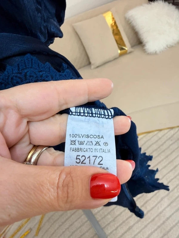 Tunica oversize panna con pizzo asimmetrico e spacco