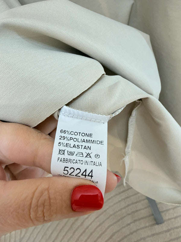 Blusa oversize panna con taglio asimmetrico e tasca