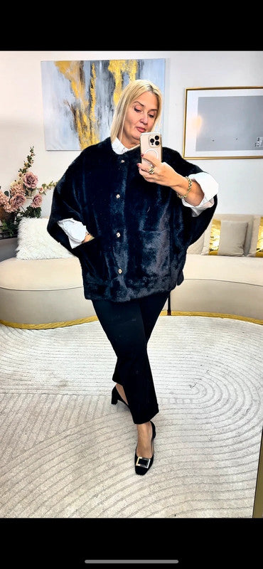 Poncho in eco-pelliccia nera