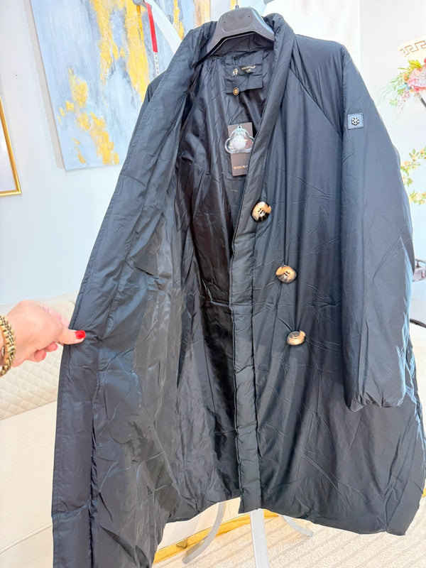 🖤 Piumino leggero e caldo – linea morbida e avvolgente