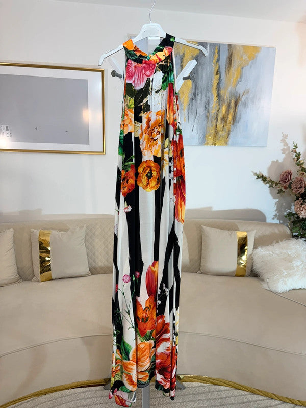 Vestito lungo fluido con stampa floreale 🌺 elegante e scenografico