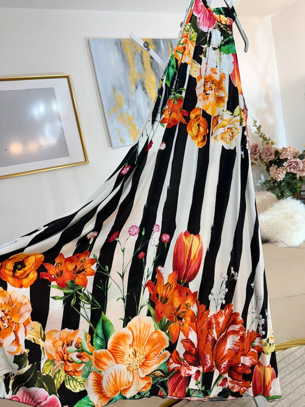 Vestito lungo fluido con stampa floreale 🌺 elegante e scenografico