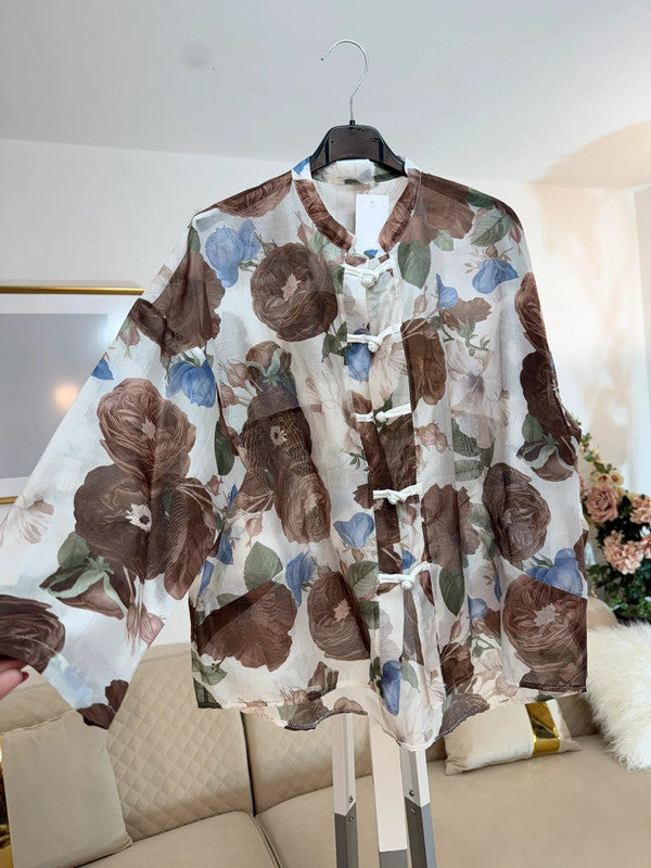 Blusa floreale elegante nei toni naturali 🤎
