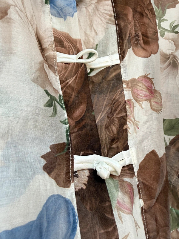 Blusa floreale elegante nei toni naturali 🤎