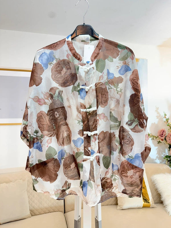 Blusa floreale elegante nei toni naturali 🤎