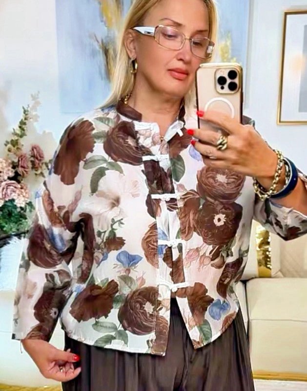 Blusa floreale elegante nei toni naturali 🤎