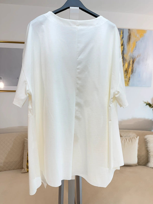 Blusa oversize panna con taglio asimmetrico e tasca
