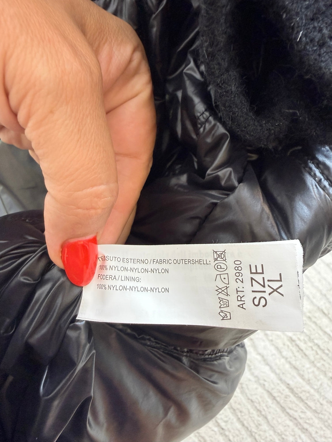 Etichetta composizione 100% nylon e taglia XL