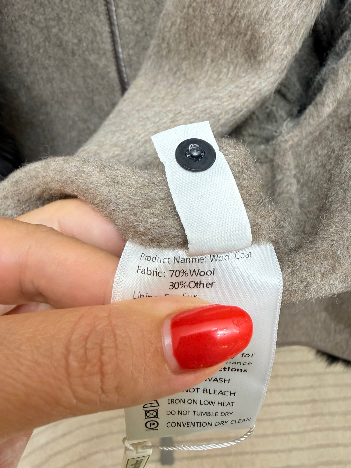 Etichetta composizione 70% lana 30% altre fibre